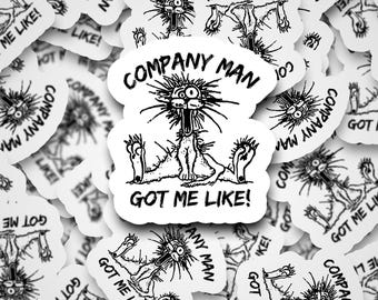 May include: White stickers with a black cartoon illustration of a creature with the text "COMPANY MAN GOT ME LIKE!". The stickers are scattered across a white surface.