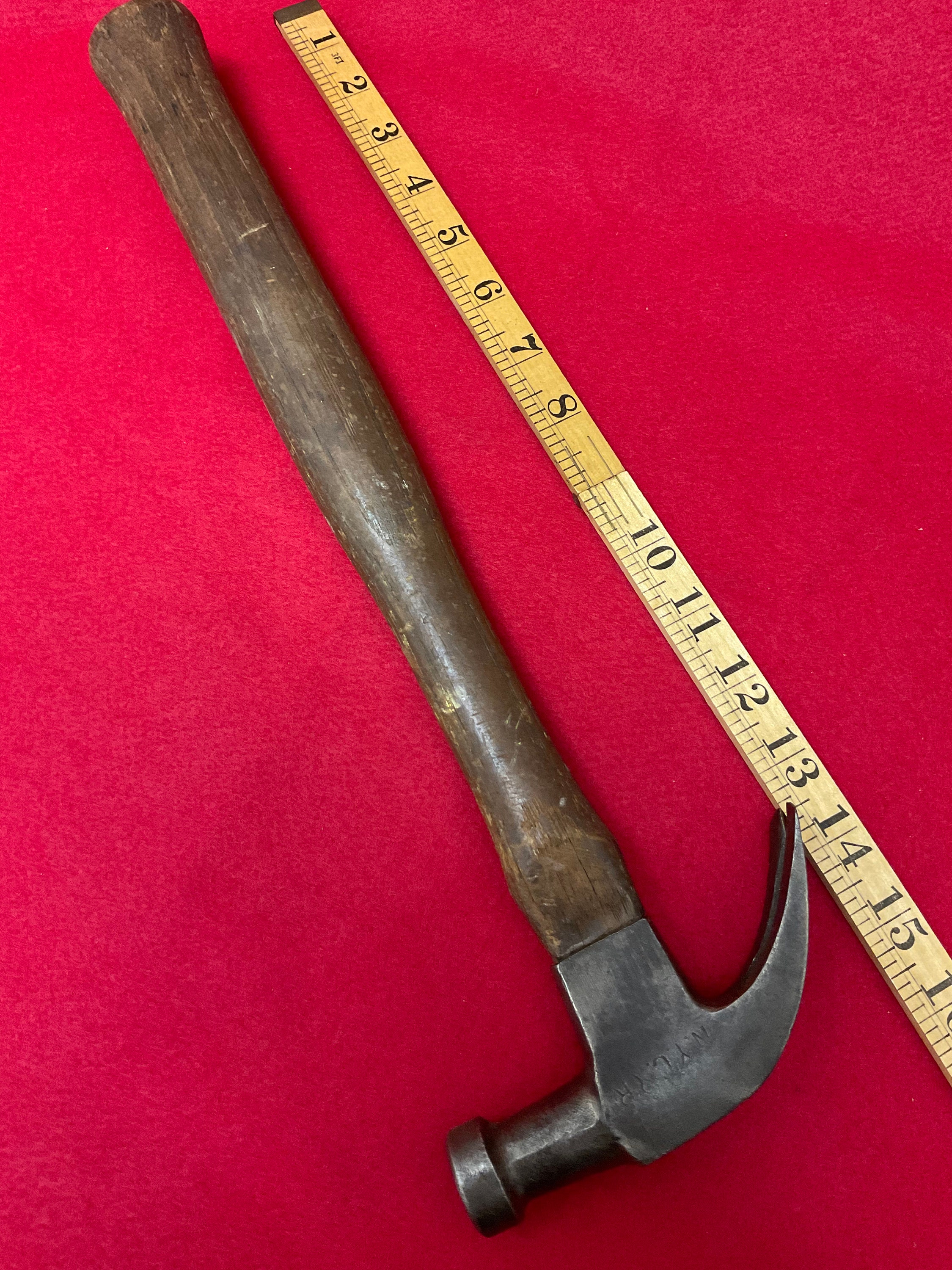 Antique claw hammer top