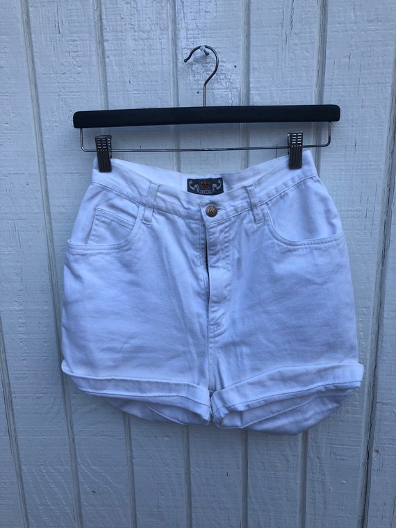 White jean shorts, size 4. Brand is The Limited