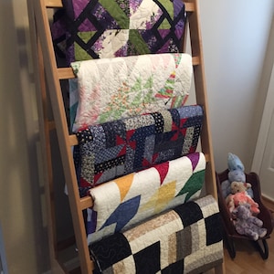 Картинки по запросу how to make wooden swing arm quilt rack