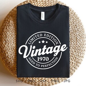 May include: Black t-shirt with a white circle graphic that says "Limited Edition Vintage 1970 Aged to Perfection".