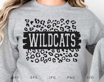 May include: A gray sweatshirt with a black leopard print design and the word "WILDCATS" in a black banner.