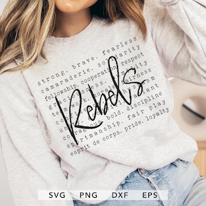 Puede incluir: Una sudadera gris claro con la palabra "Rebels" en cursiva. El diseño incluye palabras como "fuerte", "valiente" y "intrépido". La parte inferior de la imagen muestra los tipos de archivo: SVG, PNG, DXF y EPS.