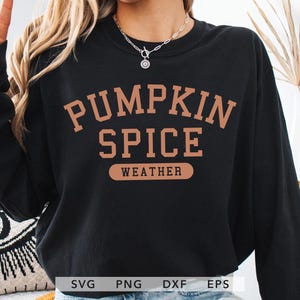 May include: Black long-sleeve sweatshirt with the text "PUMPKIN SPICE WEATHER" in a brown, collegiate-style font. The sweatshirt is a fall-themed item, perfect for autumn. The image also includes SVG, PNG, DXF, and EPS file type logos.