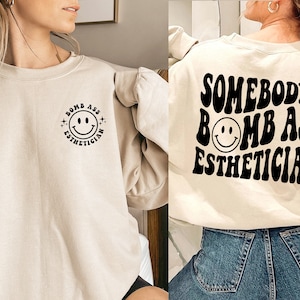 Somebody's Bomb Ass Esthetician Sweatshirt, Cute Smiley Face, Esthetician Gifts, Skincare Shirt, Skin Care Specialist, Esthetician Shirt