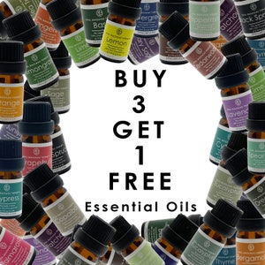 May include: A white background with the text "BUY 3 GET 1 FREE Essential Oils" in black text.  Surrounding the text are many small brown glass bottles with labels that say "OPAL MASSAGE THERAPY" and various essential oil names.