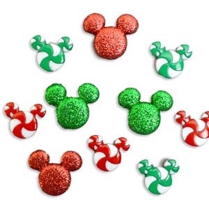 May include: Assortment of red and green glitter Mickey Mouse heads and candy cane shapes.