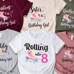 May include: Set of 8 t-shirts with a roller skate theme. The shirts are in various colours and feature the text "Custom of the Birthday Girl", "Sister of the Birthday Girl", "Brother of the Birthday Girl", "Daddy of the Birthday Girl", "Mommy of the Birthday Girl", and "Rolling into 8".