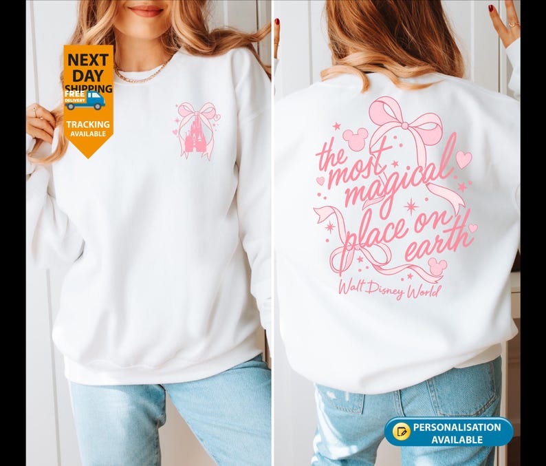 May include: White sweatshirt with a pink castle and bow design on the front. The back features the text "the most magical place on earth" with a bow and hearts. Walt Disney World is printed below the text.