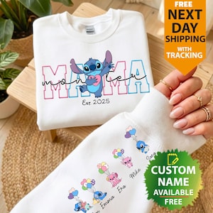 May include: White sweatshirt with a cartoon Stitch character holding a heart, and the word "Mama" in pink and blue. The sleeve features cartoon characters with names. The text "Est. 2025" is below the Stitch graphic. The sleeve also has the text "Custom Name Available Free".