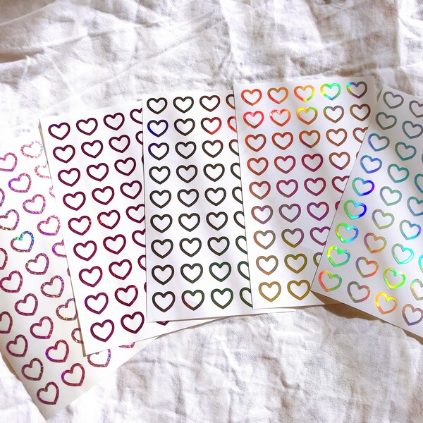 Adesivos decorativos com contorno de coração pequeno