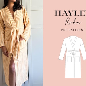 May include: A long-sleeved robe featuring a yellow and white vertical stripe pattern, a tie waist, and two front pockets. The image includes the text HAYLEY Robe PDF PATTERN and a black and white line drawing of the robe design on a pink background.