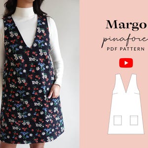 May include: A black and white floral pinafore dress with a V-neck and two pockets. The dress is shown on a model. The text "Margo pinafore PDF PATTERN" is shown in the image.