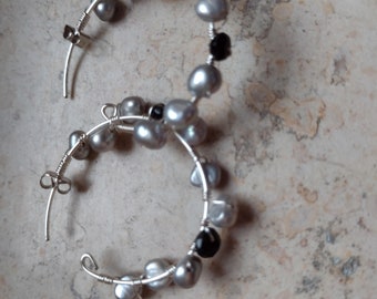 hoop earrings, with small gray baroque pearls and black tourmaline