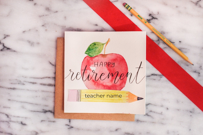 May include: A watercolor card with a red apple and a yellow pencil. The apple has the words "Happy retirement" written on it. The pencil has the words "teacher name" written on it.