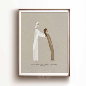 Könnte beinhalten: Ein gerahmter Kunstdruck mit einer minimalistischen Illustration von zwei Figuren. Eine Figur in Weiß reicht die Hand einer anderen in Braun. Der Text "TRUST IN THE LORD WITH ALL YOUR HEART" steht unten, darunter "PROVERBS 3:5".