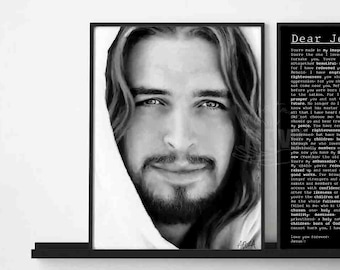 May include: Two black and white framed prints. The left print features a close-up portrait of a man with long hair and a beard. The right print features a black and white text print with the words "Dear Jennifer." at the top.