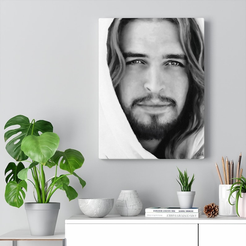 May include: Black and white portrait painting of a man with long hair and a beard. He is wearing a white robe and looking directly at the viewer.