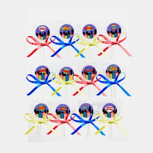 Super Hero Phrases Pop Art Phrases Lollipops with Red, Blue and Yellow Satin Ribbon Bows Party Favors Candy Buffet Giveaways Cupcake Topper