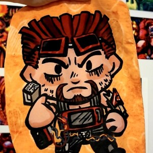 May include: A cartoon illustration of a character with red hair, sunglasses, and a beard, holding a detonator and a device. The character is depicted on an orange background.