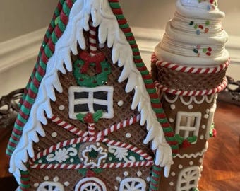 Gingerbread house large with various candies on house , lights up,( signature confirmation required)