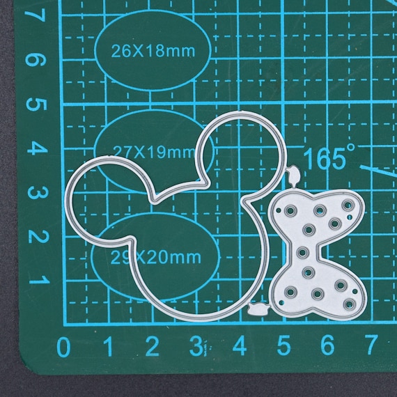 ディズニー ミニーマウスまたはミッキーマウスの耳とリボンのメタル