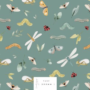 May include: A seamless pattern featuring a variety of insects and plants on a teal background. The pattern includes ladybugs, butterflies, dragonflies, caterpillars, and leaves. The text "TURF 200MM" is included in the pattern.