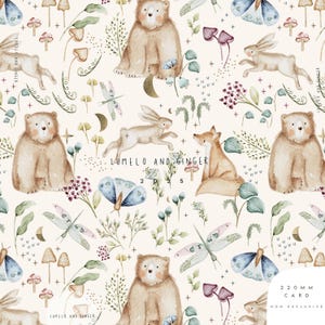 May include: A repeating pattern on a cream background featuring watercolor illustrations of brown bears, rabbits, foxes, blue butterflies, dragonflies, mushrooms, and crescent moons. The text reads Lumelo and Ginger 2025 and 220 mm card.