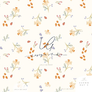 May include: A cream-colored floral pattern featuring yellow and orange flowers, small red ladybugs, and blue berries. The design includes the text "LUMELO AND GINGER" and "design studio". The bottom right corner has the text "220 MM DAF 3".