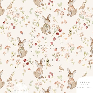 May include: A repeating pattern with watercolour illustrations of rabbits, birds, mushrooms, flowers, and berries in soft pastel colours. The design includes the text "LUMELO AND GINGER" and "220 MM CARD". The overall theme is whimsical and nature-inspired.