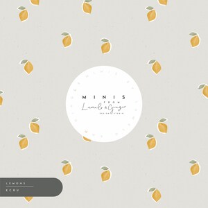 May include: A seamless pattern featuring yellow lemons with green leaves on a light beige background. The pattern includes a white circle with the text "MINIS FROM Lumelo & Ginger DESIGN STUDIO" in a circular design.