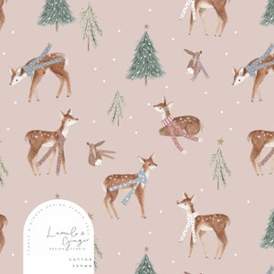 May include: A seamless pattern featuring a pink background with white dots, green trees, and brown deer wearing colourful scarves. The text "Lumelo & Ginger Design Studio 2023 Cotton 200mm" is in a white circle.