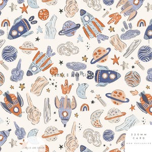 May include: A repeating pattern of rockets, planets, stars, clouds, and rainbows in shades of blue, orange, and beige. The text "LUMELO AND GINGER" and "220 MM CARD MOM EXCLUSIVE" are visible. The design is on a cream-colored background.