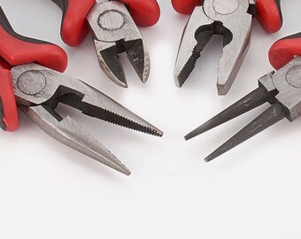 May include: Four different types of pliers with red handles. The pliers have different jaw shapes and sizes.