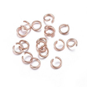Anéis de salto abertos de aço inoxidável 304 banhados a ouro rosa de 250 + 5 mm x 0,7 mm com diâmetro interno de 3,6 mm.