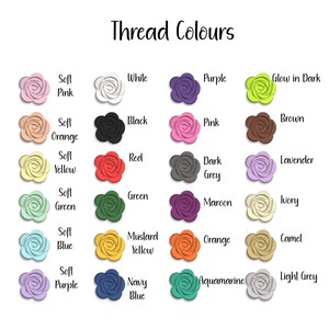 May include: A color chart titled Thread Colours featuring twenty-four small rose-shaped icons in various shades including soft pink, white, purple, glow in dark, soft orange, black, pink, brown, soft yellow, red, dark grey, lavender, soft green, green, maroon, ivory, soft blue, mustard yellow, orange, camel, soft purple, navy blue, aquamarine, and light grey.