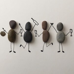 May include: A whimsical illustration of four figures crafted from smooth stones, each with a unique color and shape. They are depicted holding hands and celebrating with wine glasses and a bottle, all drawn with black lines on a white background.