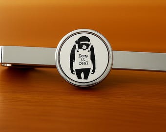 Banksy Tie Clip Bar - Keep it Real - 16mm Glass Lens  - Rhodium Plated