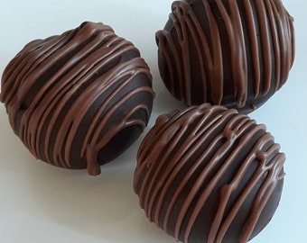 6 Delicious Fudge Truffles made with lots of Brandy or Rum...its your choice. These are always a crowd pleaser!