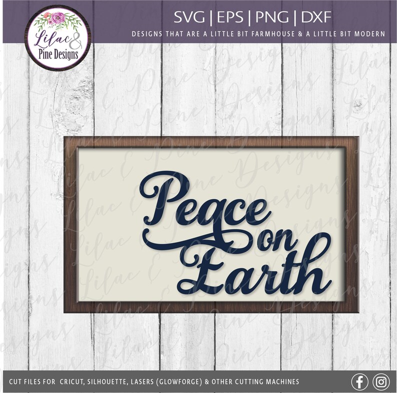 May include: A wood-framed sign with a white background and the text "Peace on Earth" in a dark blue cursive font.