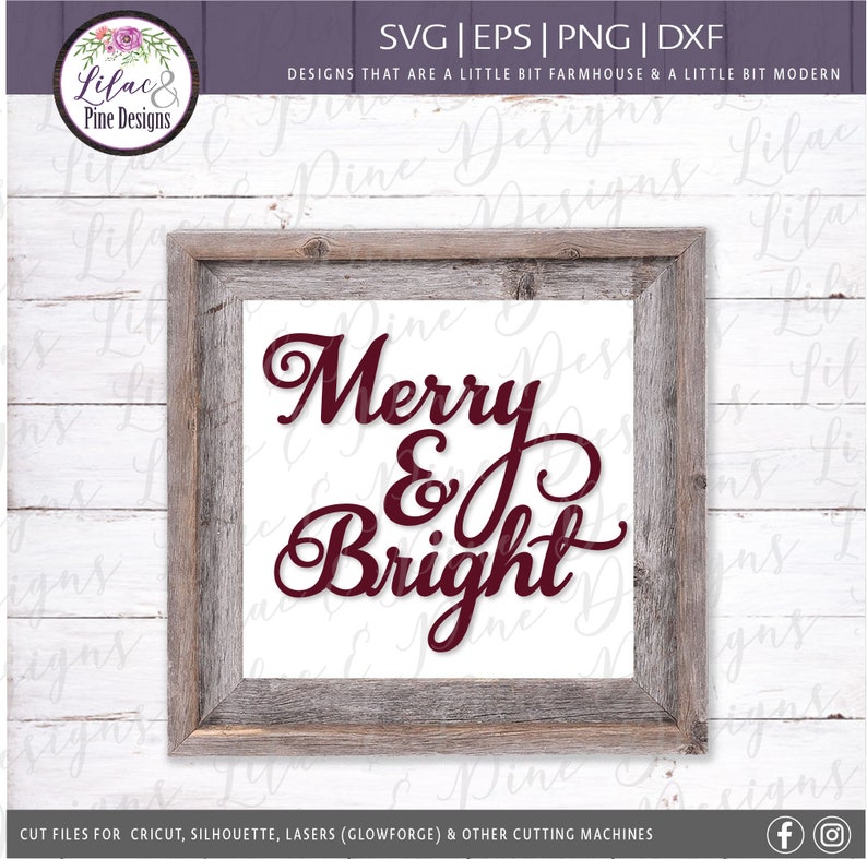 May include: A framed sign with a white background and a burgundy wood frame. The sign says "Merry & Bright" in a decorative script font.