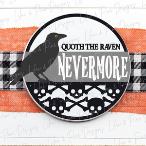 May include: A black and white round sign featuring a black raven silhouette and the text "Quoth the Raven Nevermore" in white. The sign is decorated with a black and white skull and crossbones pattern.