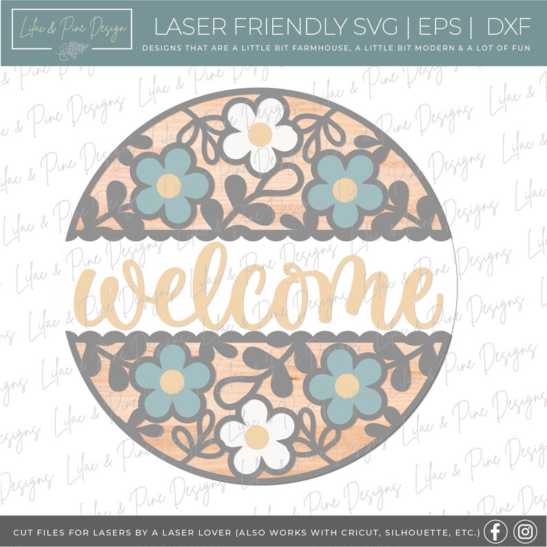 May include: A round wooden sign with a gray border and a floral design in shades of blue, white, and yellow. The sign says "welcome" in a cursive font.