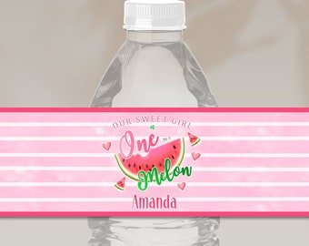 May include: A water bottle with a pink and white striped label. The label features a watermelon graphic with the text "Our Sweet Girl One Melon Amanda". Additional text includes "Edit, Download, and Print Today!" and "Matching Items Available".