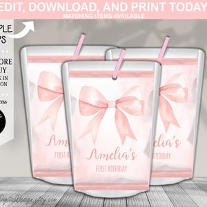 May include: Three pink and white pouch labels with a watercolor bow design. The labels say "Amelia's First Birthday" and "Amelia's Birthday".