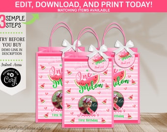 May include: Pink and white favor bags with watermelon designs and a photo of a child. The bags have the text "Our Sweet One in a Melon" and "One in a Melon" with a watermelon slice graphic. The bags also have a small circle with the text "One Melon Thank You".