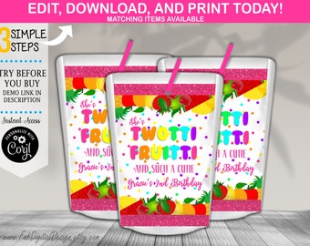 May include: Three juice pouches with pink glitter borders and colorful fruit graphics. The text reads She's TWOTTI FRUITTI AND SUCH A CUTIE Gracie's 2nd Birthday. Each pouch has a pink straw and is decorated with polka dots and various fruits.