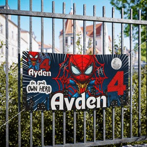 May include: A blue and red banner featuring a cartoon Spiderman character, the number 4, and the text "Ayden Be your own hero Ayden".