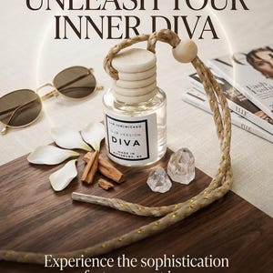 May include: A car and home diffuser with the text "UNLEASH YOUR INNER DIVA". The clear glass bottle has a wooden top and a label that reads "DIVA". The image includes sunglasses, crystals, and magazines.