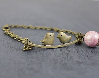 Bracelet with birds, antique bronze, pearl marbled in pink